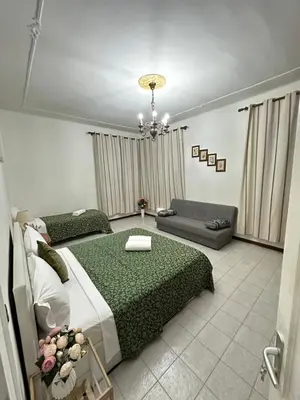 Letto o letti in una camera di Arham Guesthouse Bembo 13