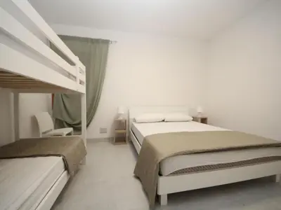 Letto o letti in una camera di Apartment Marcello-7 by Interhome