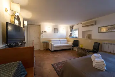 Letto o letti in una camera di Ca d'Oro Monolocale