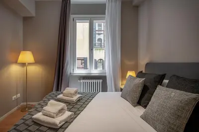 Letto o letti in una camera di San Marco Boutique by Wonderful Italy