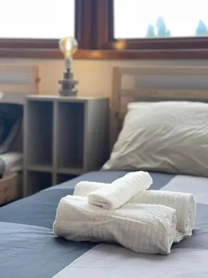 Letto o letti in una camera di Fonderia's Home - Parcheggia Senza Pensieri!