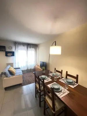 Area soggiorno di Fonderia's Home - Parcheggia Senza Pensieri!
