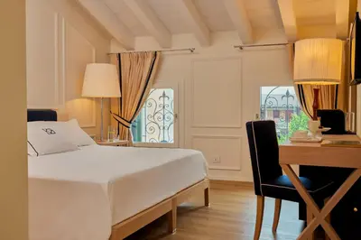 Letto o letti in una camera di Casa Pierdonà