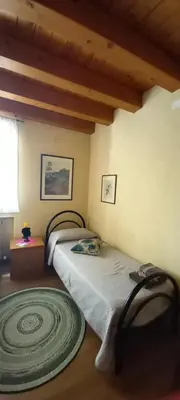 Letto o letti in una camera di B&B Palmagrill