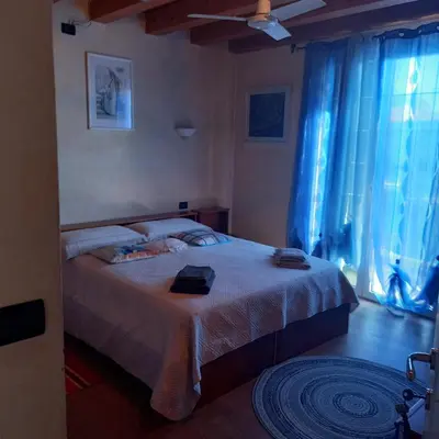 Letto o letti in una camera di B&B Palmagrill