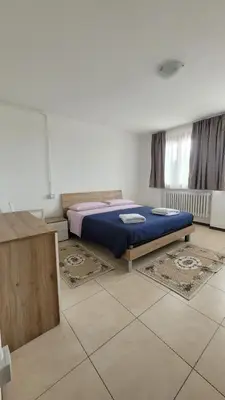 Letto o letti in una camera di Corte Azzurra