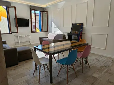 TV o dispositivi per l'intrattenimento presso Luxury Apartments Riva Vena VISTA CANALE