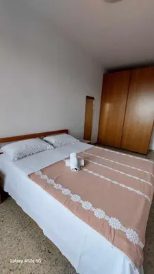 Letto o letti in una camera di #Punto FM 5#