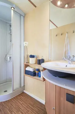 Bagno di Feriendorf Oasi Mobilehome Tahiti für 4 Personen
