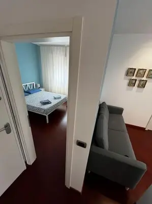 Letto o letti in una camera di Piccolo attico a Sottomarina centro 