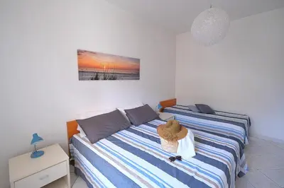 Letto o letti in una camera di Diplomatic Bilo Vista mare Piazza Torino