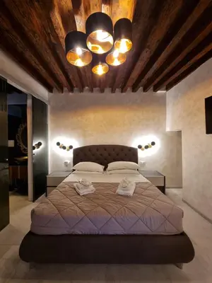 Letto o letti in una camera di San Marco 3097 - LuxuryJacuzzi