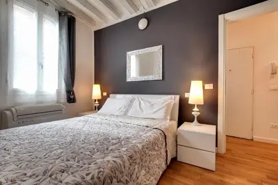 Letto o letti in una camera di Charming Castello Apartments by Wonderful Italy
