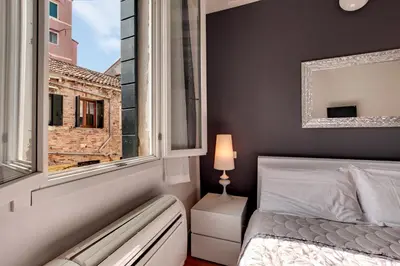 Letto o letti in una camera di Charming Castello Apartments by Wonderful Italy