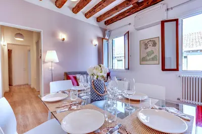 Area soggiorno di Botteri Palace Apartments by Wonderful Italy