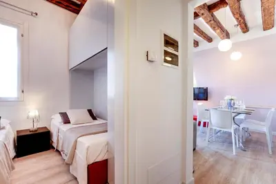 Letto o letti in una camera di Botteri Palace Apartments by Wonderful Italy