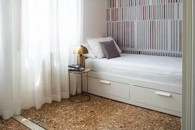Letto o letti in una camera di San Domenico Apartment with Garden View R&R