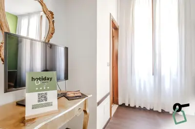 TV o dispositivi per l'intrattenimento presso HOTIDAY Room Collection - Venezia Santa Lucia
