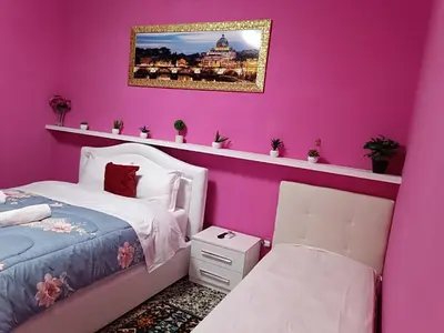 Letto o letti in una camera di Locazione turistica 2