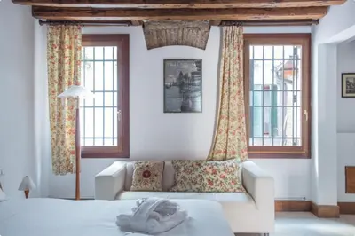 Letto o letti in una camera di Corte Nova Apartment