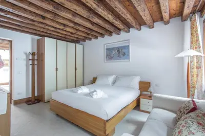 Letto o letti in una camera di Corte Nova Apartment