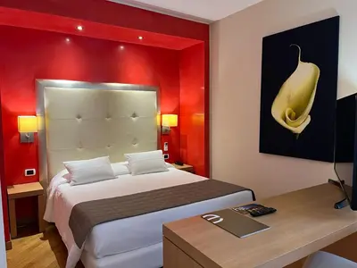 Letto o letti in una camera di Hotel Europa