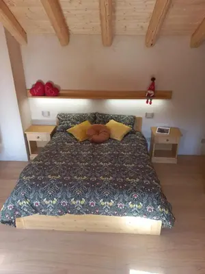 Letto o letti in una camera di Sul Collagù