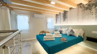 Area soggiorno di Graceful Apartments Paradise by Ca-Sa Check