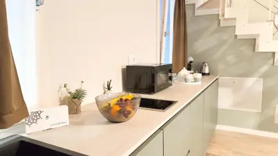 Cucina o angolo cottura di Graceful Apartments Paradise by Ca-Sa Check