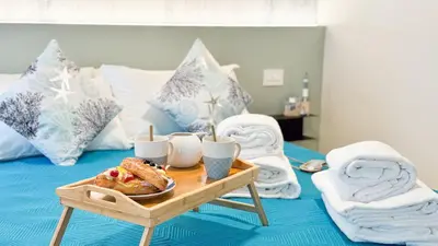Letto o letti in una camera di Graceful Apartments Paradise by Ca-Sa Check