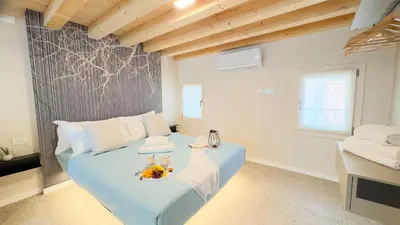 Letto o letti in una camera di Graceful Apartments Purgatory by Ca-Sa Check