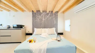 Letto o letti in una camera di Graceful Apartments Purgatory by Ca-Sa Check