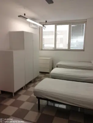 Letto o letti in una camera di Appartamento per 6 Lavoratori