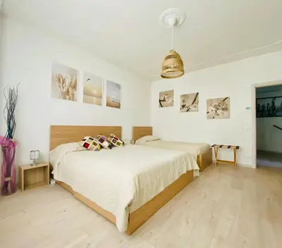 Letto o letti in una camera di Laura's House