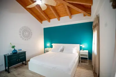 Letto o letti in una camera di Casa Bettina