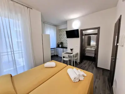 Letto o letti in una camera di Belfiore Alloggi Turistici