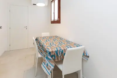 Letto o letti in una camera di Accogliente Monolocale Veneziano1 Aria Condizionata, vicino a campus e stazione