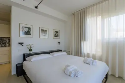 Letto o letti in una camera di Yourbanflat Colonna Garibaldi