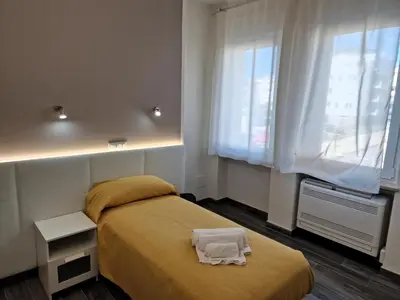 Letto o letti in una camera di Medici Alloggi Turistici