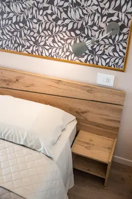 Letto o letti in una camera di Fienile Nonna Elide