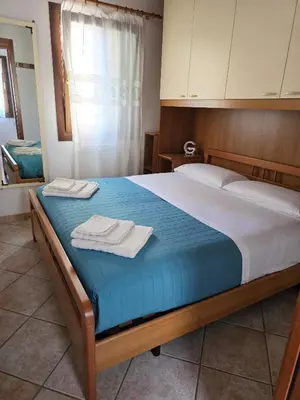 Letto o letti in una camera di La Casa di Giorgia