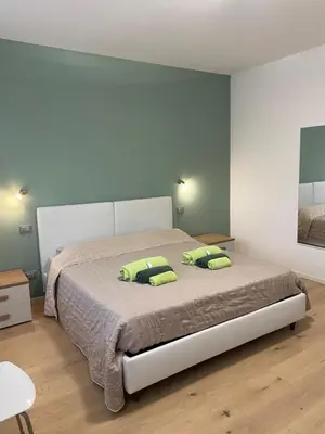 Letto o letti in una camera di Bollicine&Relax