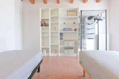 Letto o letti in una camera di Queen Home Beauty