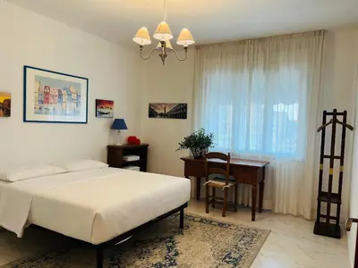 Letto o letti in una camera di Thalia Venezia appartamento accogliente