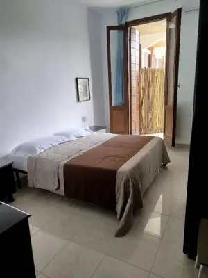 Letto o letti in una camera di Casa PATRIZIA