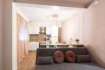 Cucina o angolo cottura di EnJoy Home - Appartamento elegante con giardino
