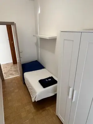 Letto o letti in una camera di Appartamento Centro Conegliano Eleganza e Comfort