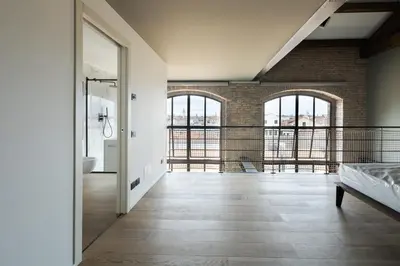 Letto o letti in una camera di Venice Penthouse - Loft with Canal View