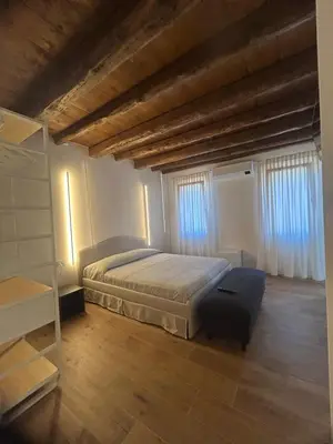 Letto o letti in una camera di Casa Milena