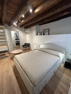 Letto o letti in una camera di Casa Milena